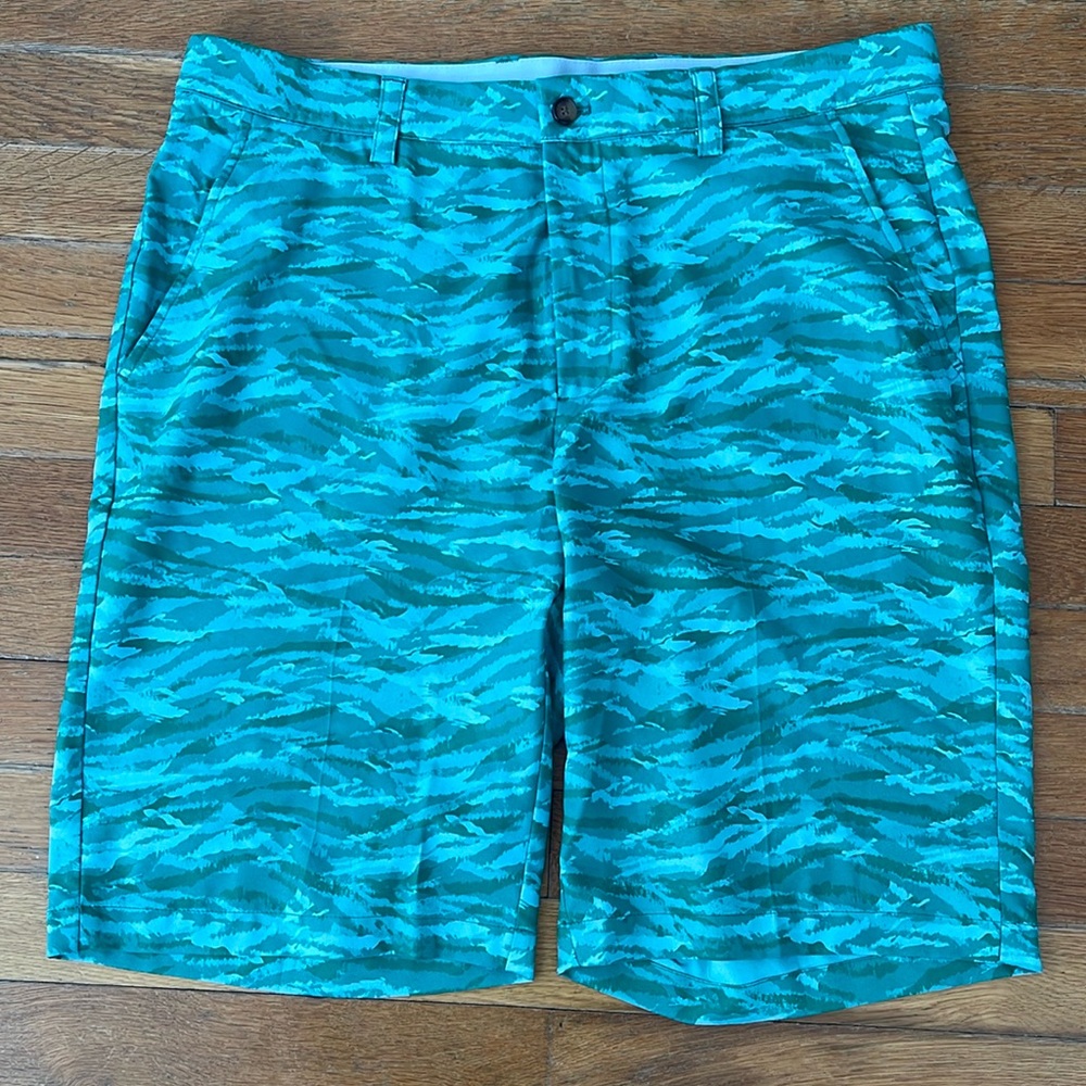 Greg Norman ML75 microlux golf shorts in a camo green style